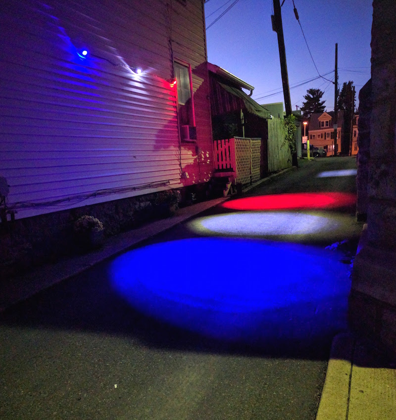 Customer uses 20W red, white, and blue LED spotlights to light up street